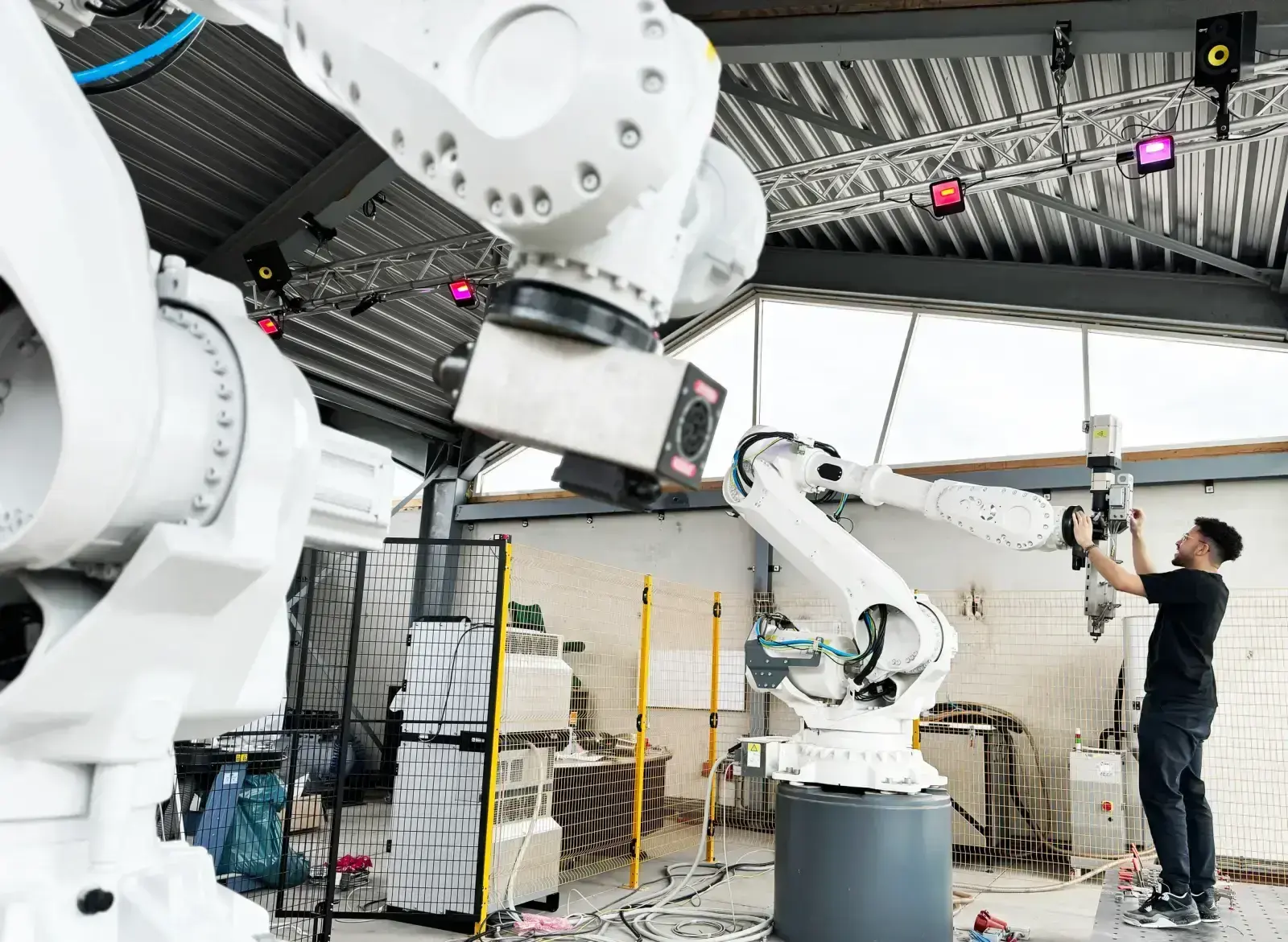 Industrial robot arm extrusion testing cell