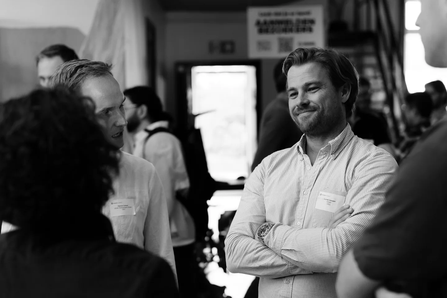 A conversation in the event space.